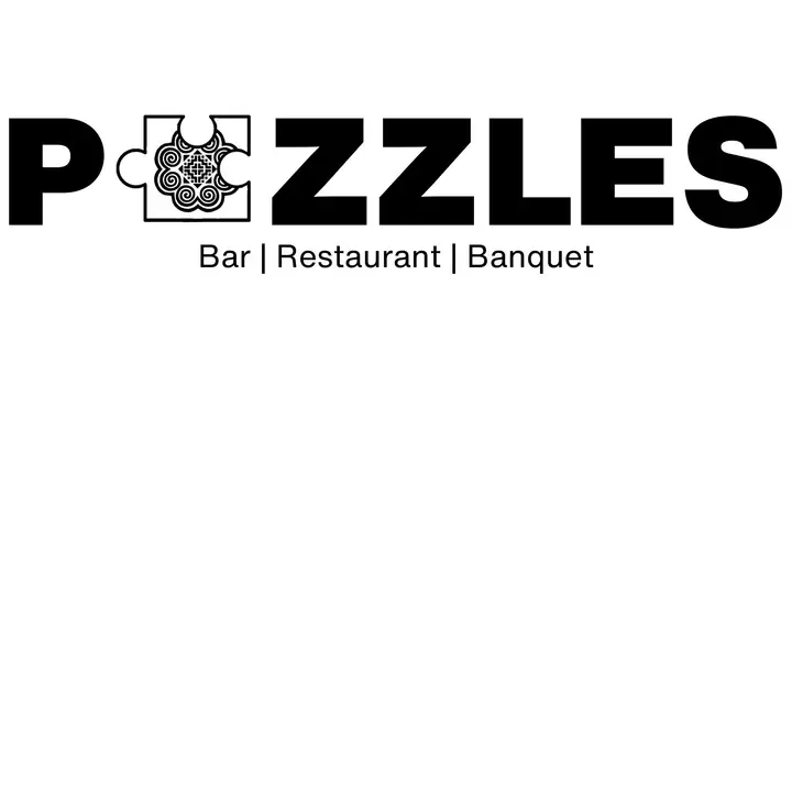 Puzzles Bar Restaurant Banquet photo — Restaurant
